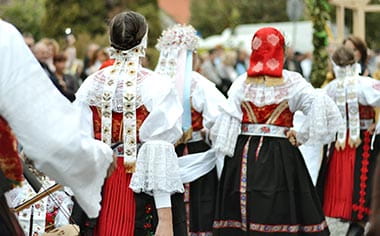 People wearing traditional Slovakian costume